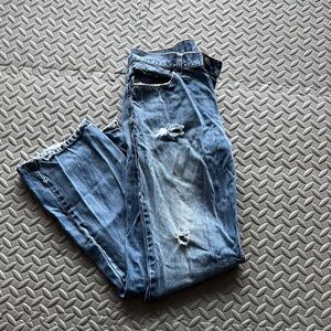 Distressed Blue Jeans